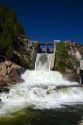 Water pouring from the outlet of Cascade Dam on Cascade Reservior flowing into the Payette River in Valley County, Idaho.