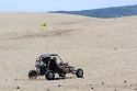 Dune buggy driving on sand dunes at St. Anthony, Idaho.