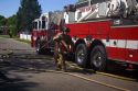 Firefighter carrying hose in Boise, Idaho.