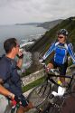 French bicyclists along the coast near Deba, Guipuzcoa, Basque Country, Spain. MR
