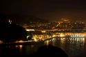 La Concha Bay and the city of Donostia-San Sebastian at night, Guipuzcoa, Basque Country, Northern Spain.