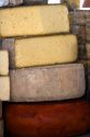 Cheese being sold at an outdoor market in the town of Cangas de Onis, Asturias, northern Spain.