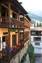 People dine on the balconey of a restaurant in the town of Potes, Liebana, Cantabria, northwestern Spain.