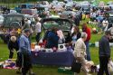 People buy and sell household items at a car boot sale in the market town of Banbury, Oxfordshire, England.