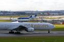 Emirates Boeing 777 airliner on the runway at London Heathrow Airport, England, United Kingdom.