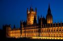 The Houses of Parliament at night in the city of London, England.