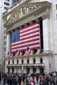 American flags in front of the New York Stock Exchange in New York City, New York, USA.