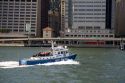 New York City Police Department Harbor Unit Scuba Team boat on the East River, New York, USA.