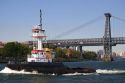 Tugboat on the East River in New York City, New York, USA.