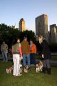 Dog owners socialize in Central Park, Manhattan, New York City, New York, USA.