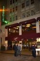 Police officers question a man in front of Sardi's restaurant in the Theatre District of Manhattan, New York City, New York, USA.