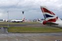 Airliners on the runway at London Heathrow Airport, England, United Kingdom.