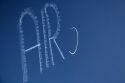 Small airplane sky writing over Boise, Idaho, USA.