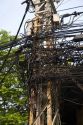 A tangle of telephone wires on a utility pole in Ho Chi Minh City, Vietnam.