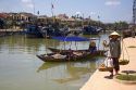 Vietnamese women selling produce along the Thu Bon River at Hoi An, Vietnam.