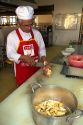 Chefs prepare food at a trade school in Dong Ha, Vietnam.