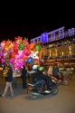 Street vendors selling colorful balloons for Tet in Hanoi, Vietnam.