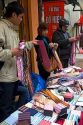 Silk necktie vendor on the street in Hanoi, Vietnam.