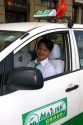 Vietnamese taxi cab driver in Ho Chi Minh City, Vietnam.