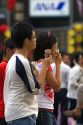 Vietnamese teens eat ice cream in Ho Chi Minh City, Vietnam.