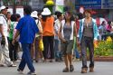 Vietnamese girls hold hands as a cultural jesture in Ho Chi Minh City, Vietnam.