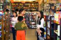 Vietnamese people shopping in a bookstore in Ho Chi Minh City, Vietnam.