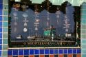 Reflection of harbor in Mediterranean Cafe window in the town of Avalon on Catalina Island, California, USA.