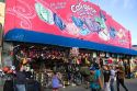People and boardwalk retail space at Venice Beach, Los Angeles, California.