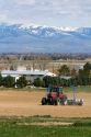 Farmer planting corn crop in Canyon County, Idaho, USA.
