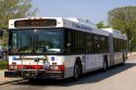 Diesel-electric hybrid public city bus in Chicago, Illinois, USA.