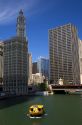 Water taxi on the Chicago River in downtown Chicago, Illinois, USA.