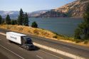Truck transporting freight through the Columbia River Gorge near Hood River, Oregon, USA.