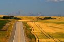 Teton Range in the distance along Idaho Highway 32 near Ashton, Idaho, USA.