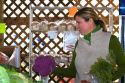 Woman shopping for purple cauliflower at a farmers market in Fruitland, Idaho. MR