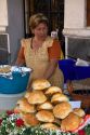 Woman selling bread at an outdoor market in the city of Puebla, Puebla, Mexico.