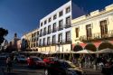 Street scene with traffic in the city of Puebla, Puebla, Mexico.