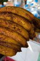 Street vendor selling roasted bananas in Acapulco, Guerrero, Mexico.