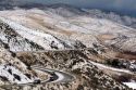 Winter weather driving on icy roads in the foothills near Boise, Idaho, USA.