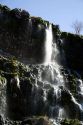 Natural spring water flowing out of lava rock at the Thousand Springs area of the Snake River in the Hagerman Valley, Idaho, USA.