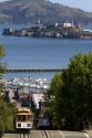 Cable car and Alcatraz Island in San Francisco, California, USA.