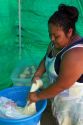 Native Pueblo woman making indian fry bread at Santo Domingo Pueblo, New Mexico, USA. MR