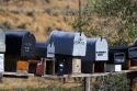 Mailboxes lined up for the delivery of mail in a rural area near Challis, Idaho, USA.