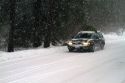 Winter driving in snow and ice at Mores Creek in Boise County, Idaho, USA.