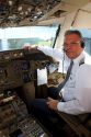 Copilot in the cockpit of a Boeing 767 aircraft.