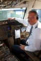 Copilot in the cockpit of a Boeing 767 aircraft.