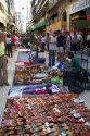 Street vendor selling shoes along the pedestrian section of Florida Street in the Retiro barrio of Buenos Aires, Argentina.