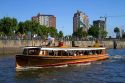 Vintage mohogany motorboat on the Parana Delta at Tigre, Argentina.