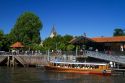 Vintage mohogany motorboat on the Parana Delta at Tigre, Argentina.