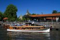 Vintage mohogany motorboat on the Parana Delta at Tigre, Argentina.