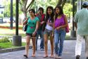 Teenage peruvian girls walking in Central Park of the Miraflores district of Lima, Peru.